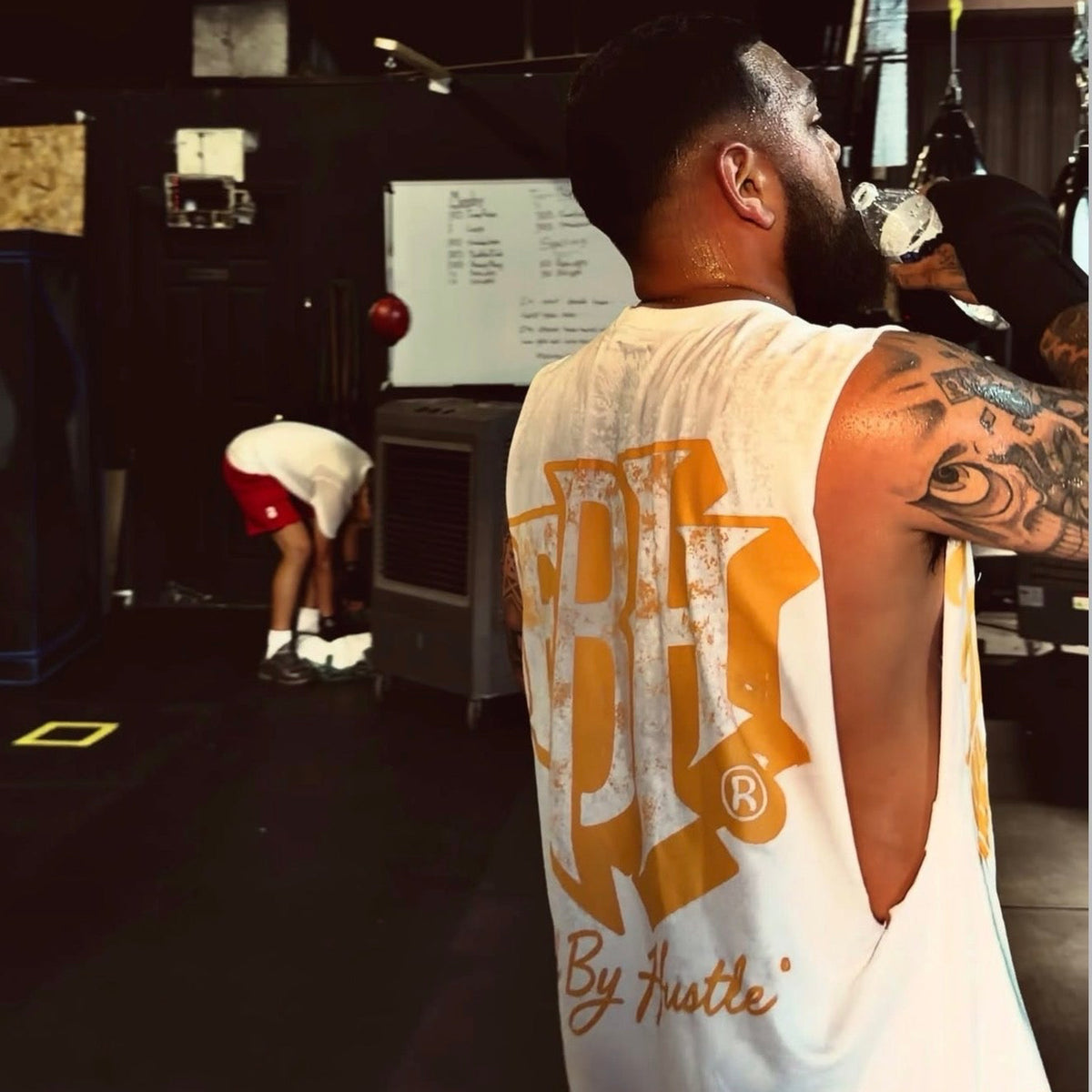 Fueled by Hustle Oversized Tee — White/Gold